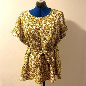 Lane Bryant plus size top in bright yellow flowers.